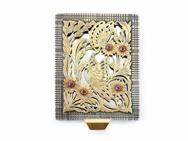 Yellow gold and silver Boucheron compact with rubies