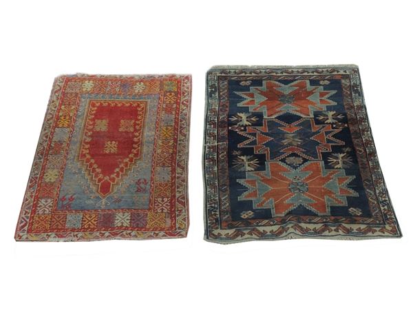 Two caucasic carpets