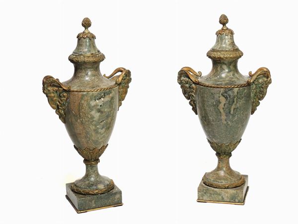 A pair of green marble and gilted bronze potiche vases