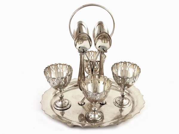 A silver plated eggs set