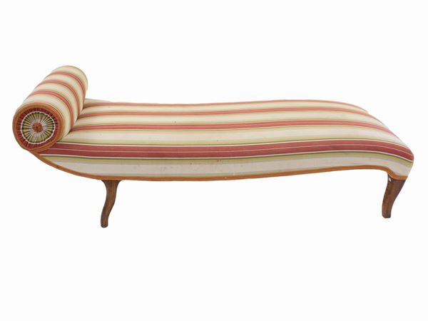 A padded and covered striped fabric dormeuse