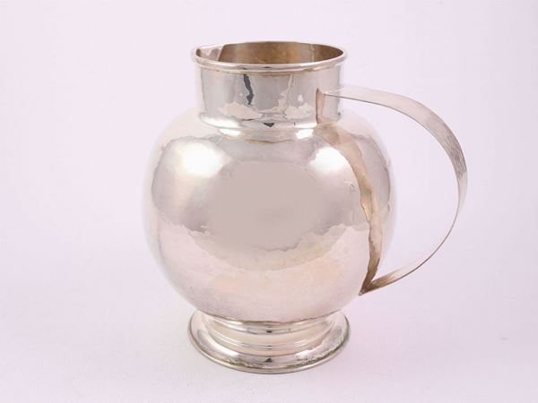 A silver Braganti Florence jug