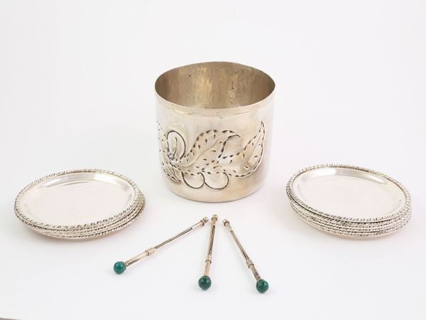 A silver table accessories