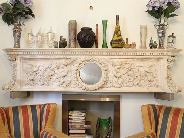 A white marble fireplace fronton