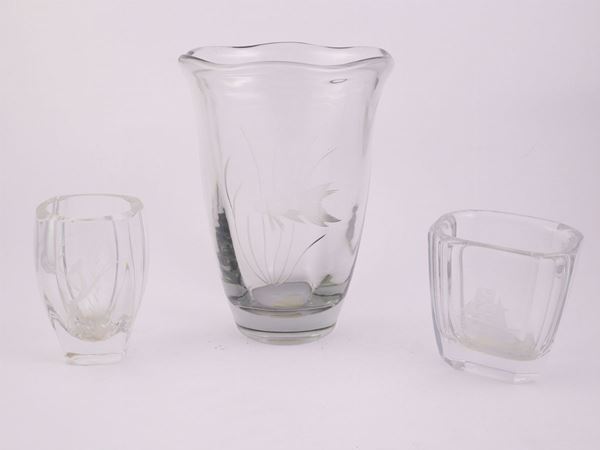 Three crystal engraved vases