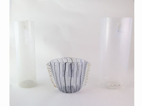 A tubular half filigree glass vase and two glass vases with different filigree technics
