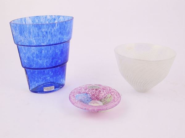 One blue glass vase, one glass vase and a small glass plate