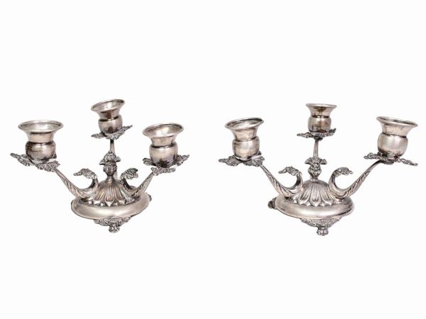 Coppia di piccoli candelabri in argento