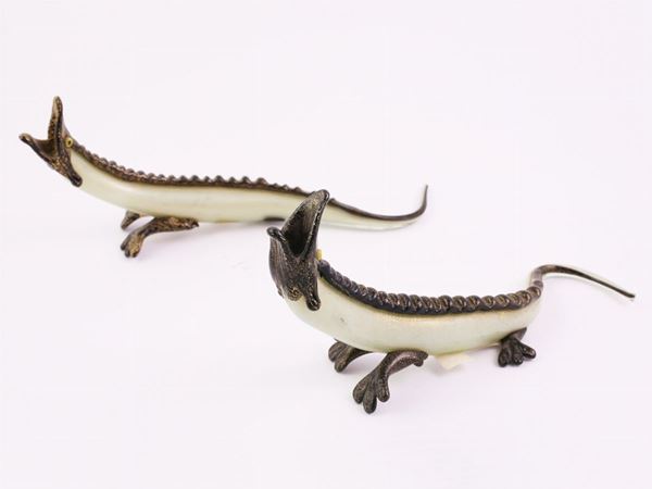 A pair of blown glass green lizard with golden inclusion