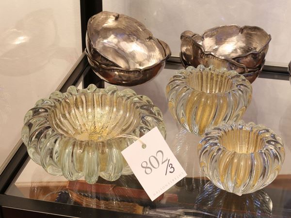 Three glass ashtrays with gold inclusions
