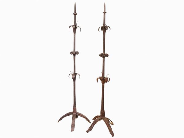 A pair of wrougth iron candelabra