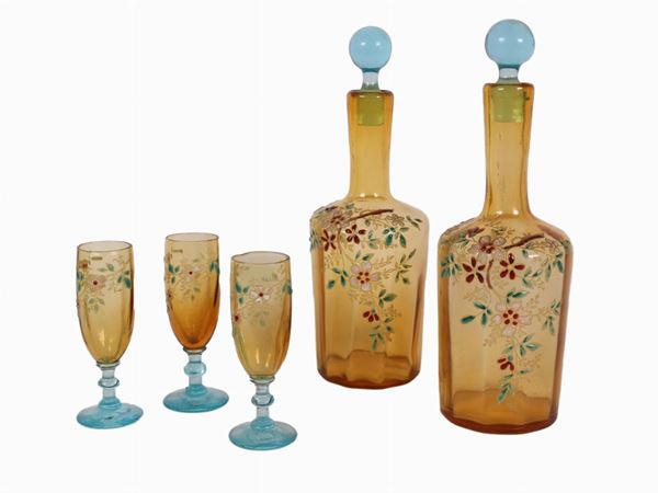 Pair of bottles and three glass with enamled flowers and leaves