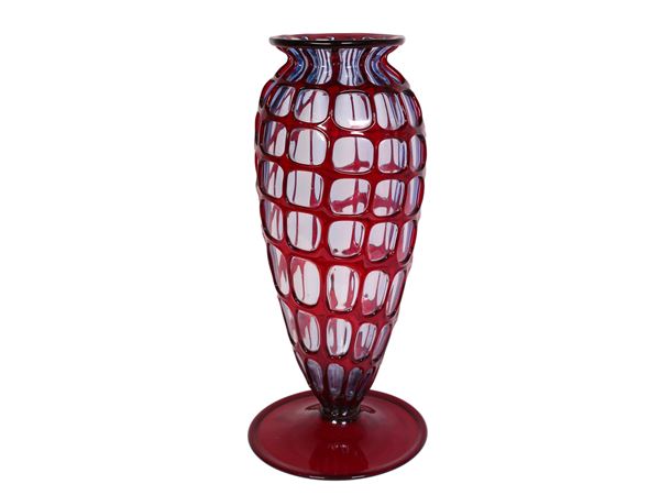 A mosaic red blown glass vase like a net, attributed to Ferro Toso