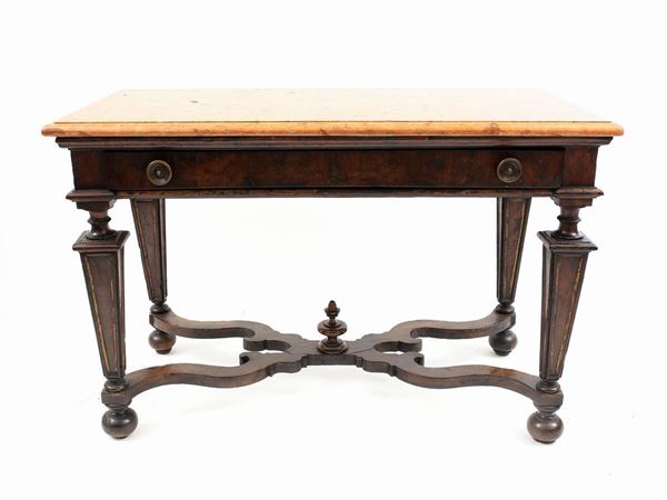 A veneered walnut table
