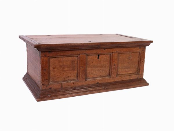 A walnut and other woods casket