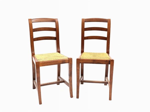 Serie di dieci sedie in rovere