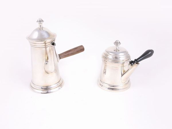 A solitaire silver chocolate pot and another one in silver plated