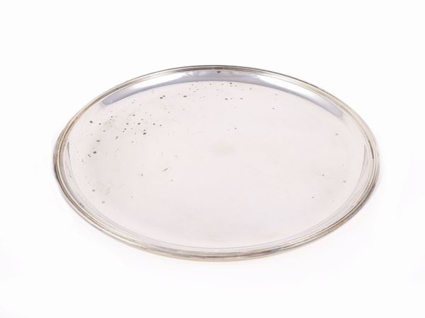 A silver circular tray