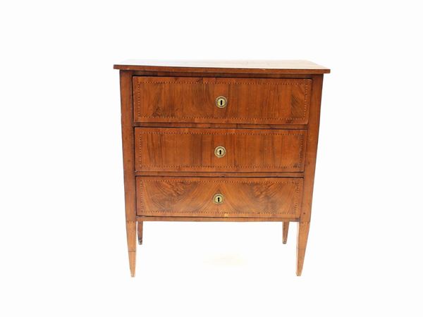 A small walnut and cherrywood veneered commode