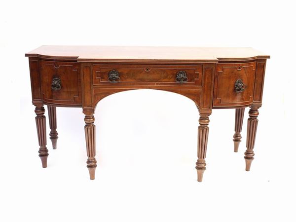 A mahogany veneered console