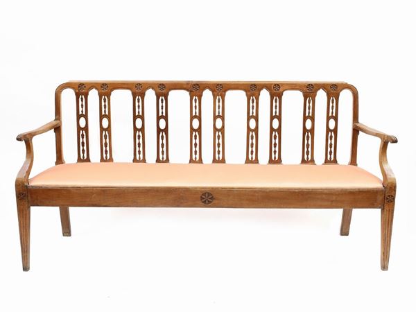 A cherrywood bench sofa