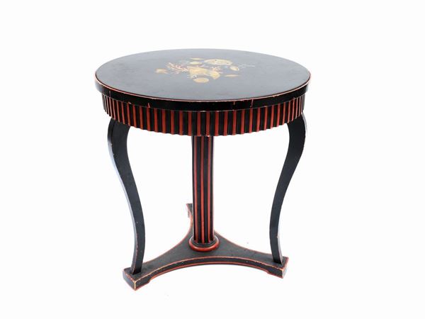 A laquered wood and scagliola small circular table