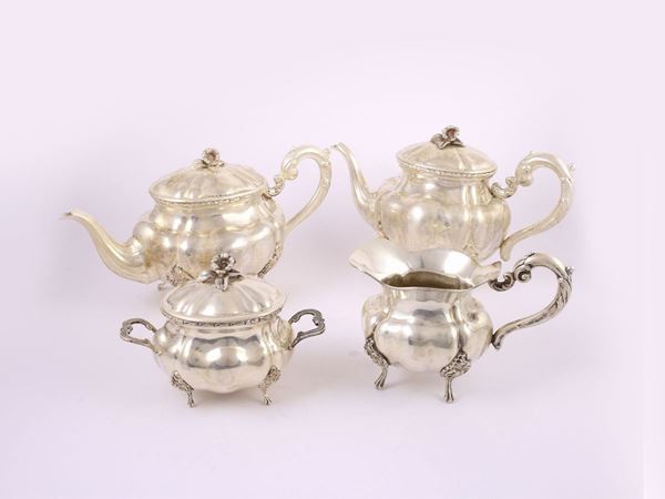 A silver coffe and tea set