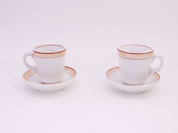 Serie di undici tazze da caffè in porcellana Ginori