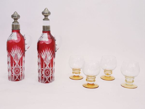 A pair of red Bohemian crystal bottles