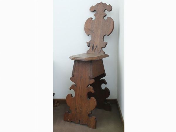 A pair of walnut stools