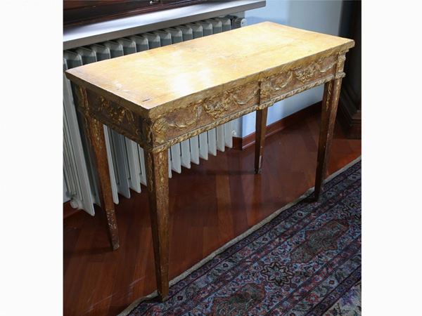 A giltwood and painted console