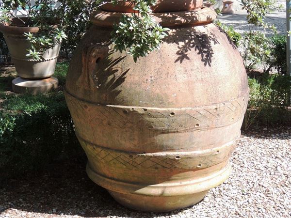 A large ancient galestro terracotta jar