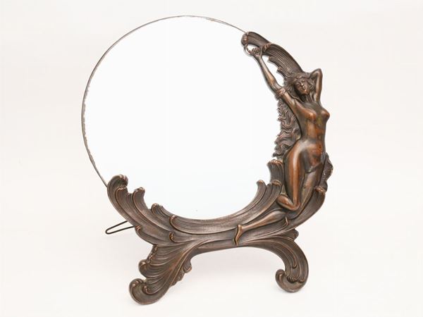 A vanity brass mirror Liberty style  (early 20th century)  - Auction House Sale: Curiosities: Vintage, Garret and Cellar - Maison Bibelot - Casa d'Aste Firenze - Milano