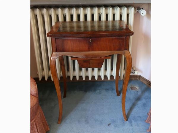 A walnut sewing table