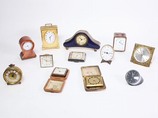 Twelve travel alarm clocks  (early 20th century)  - Auction House Sale: Curiosities: Vintage, Garret and Cellar - Maison Bibelot - Casa d'Aste Firenze - Milano