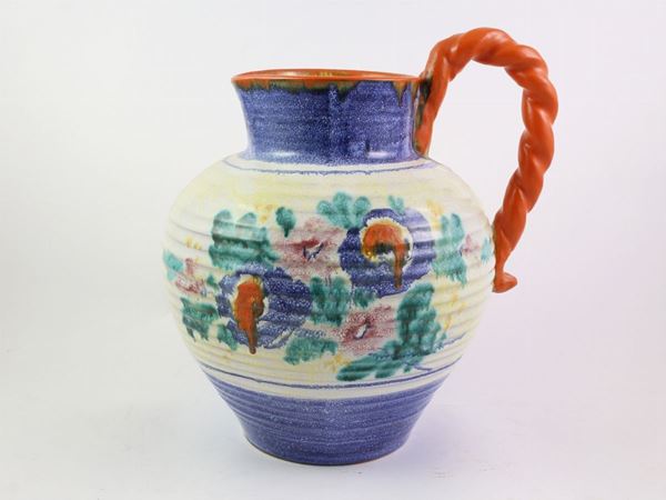 A large glazed terracotta pitcher