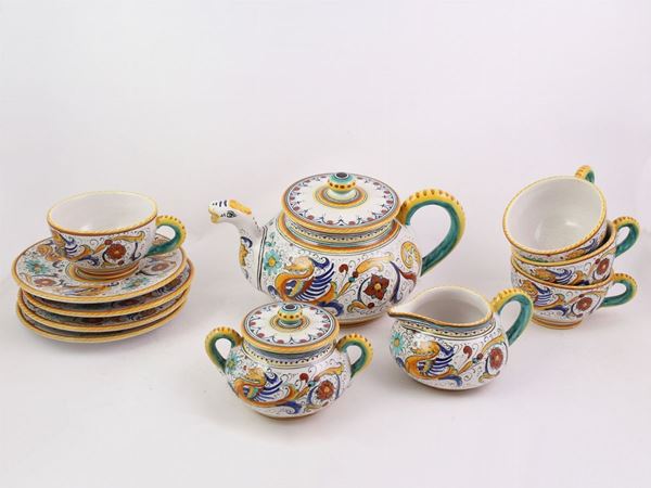 A glazed terracotta tea service