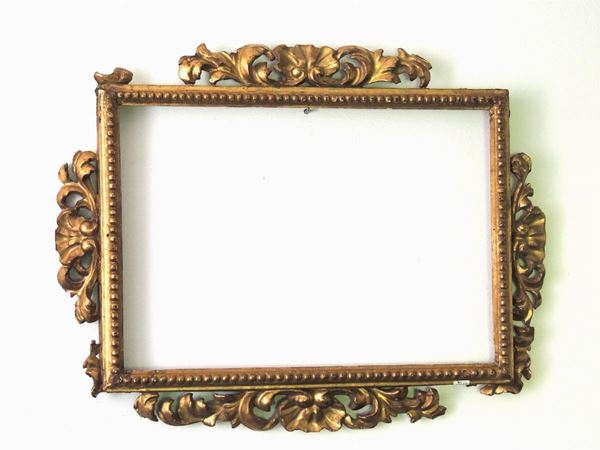 Two curved and giltwood frames