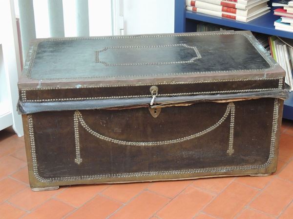 A camphor wood and black leather trunk
