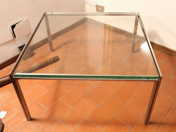 A metal and crystal coffee table