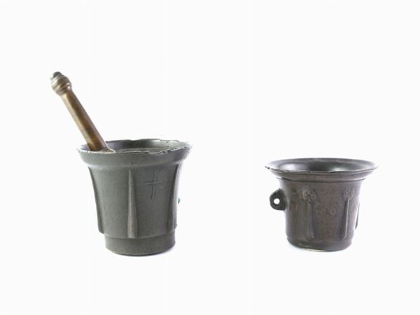 Two bronze mortars with pestels