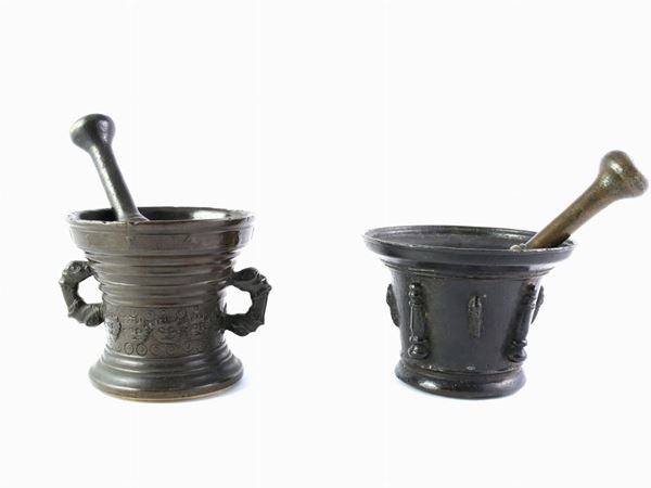 Two bronze mortars with pestels