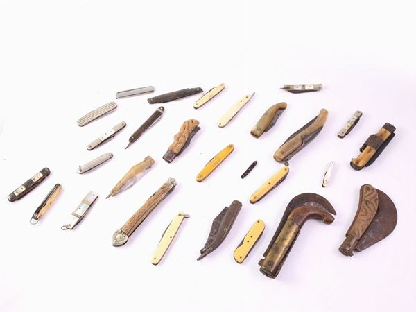 A collection of twenty seven switchblade knife