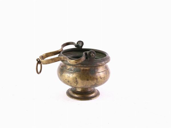 A bronze bucket for holy water