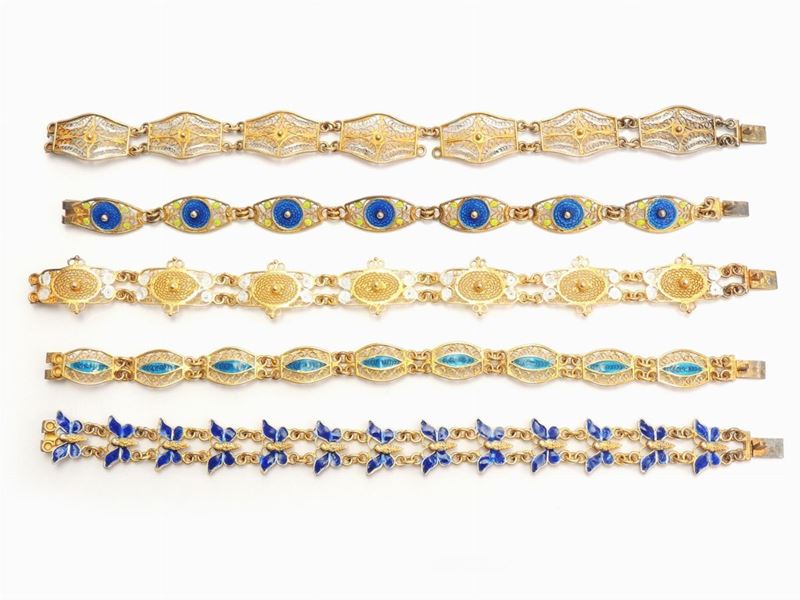Nove Bracciali in Argento 800/1000 e Smalti Policromi