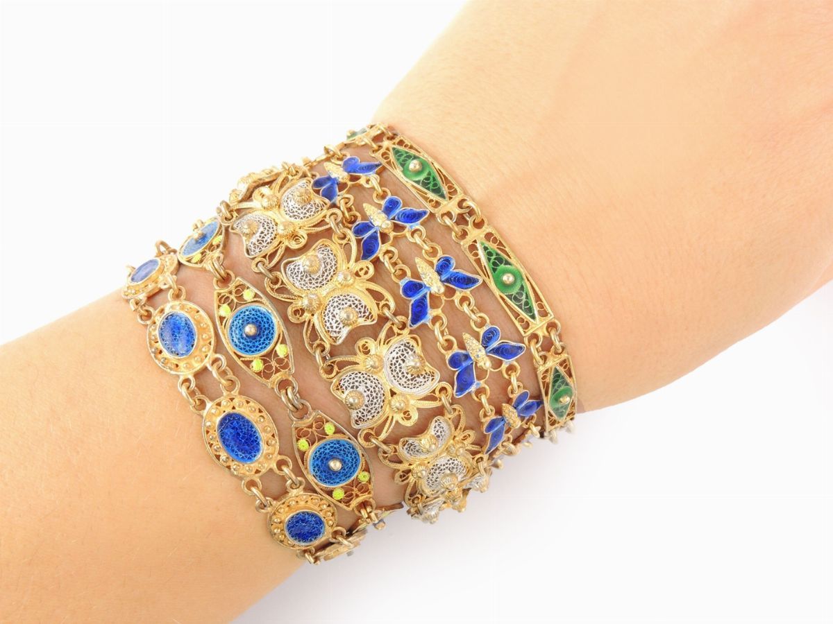 Nove Bracciali in Argento 800/1000 e Smalti Policromi