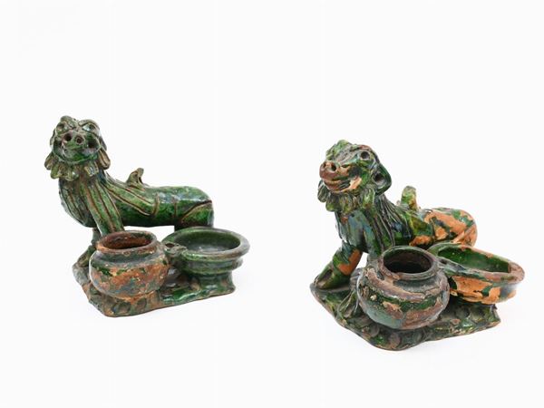 A pair of glazed terracotta inkstand