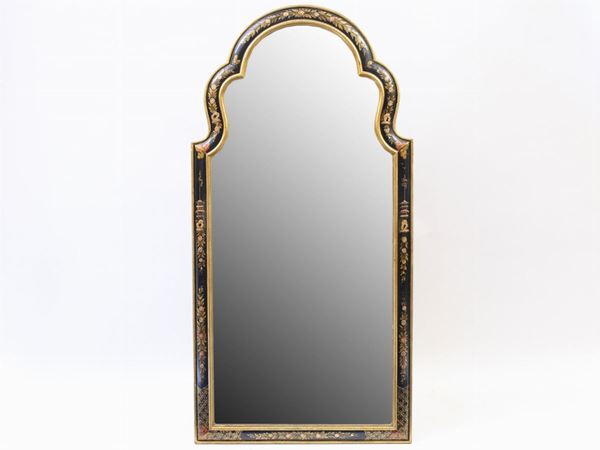 A lacquered wooden mirror