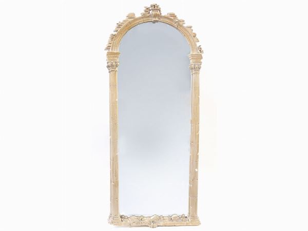 A large wooden frame mirror