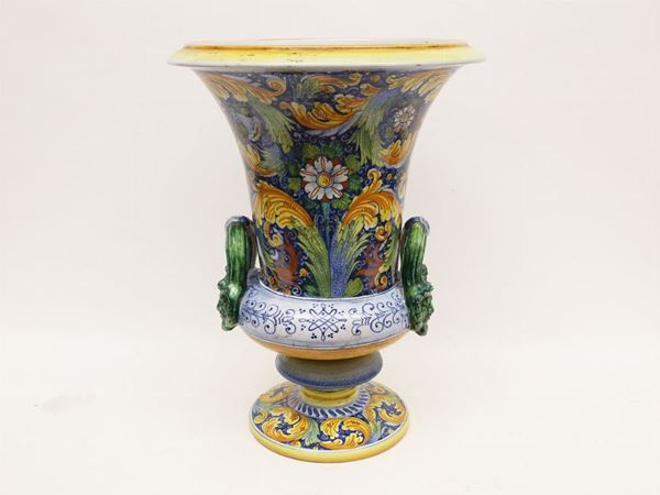 A large glazed and painted terracotta vase
